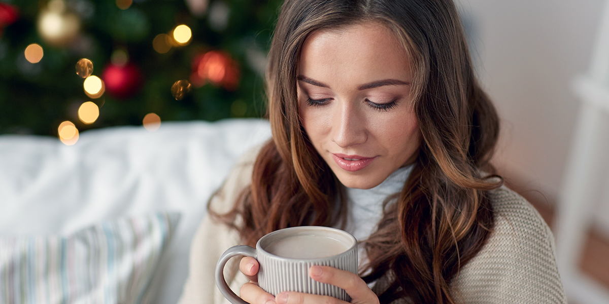 christmas-relax-woman-coffee-hot-chocolate-drink-shutterstock.jpg